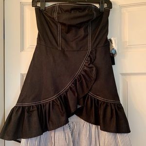 Strapless black dress with a twist